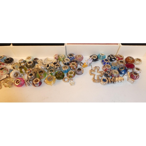 25 - Eight Pandora gift boxes; and Pandora style coloured bead charms