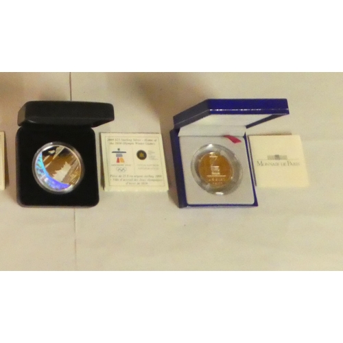 32 - Eight variously themed silver proof coins  boxed