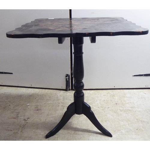 327 - An early 20thC and later Japanese inspired black painted and gilded tip-top pedestal table  28