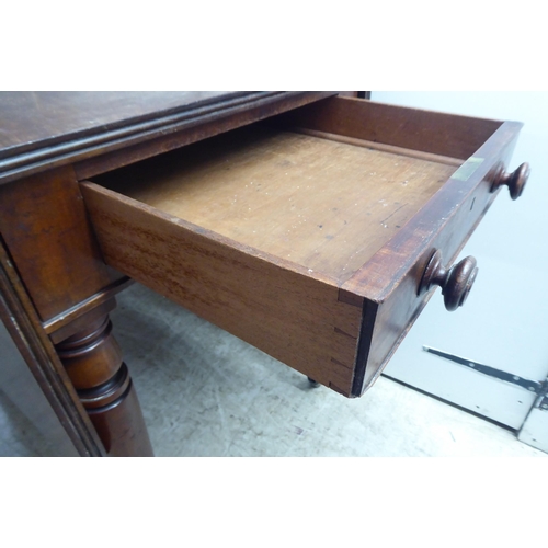 329 - A late Victorian mahogany Pembroke table, raised on ting turned, tapered legs and brass capped caste... 