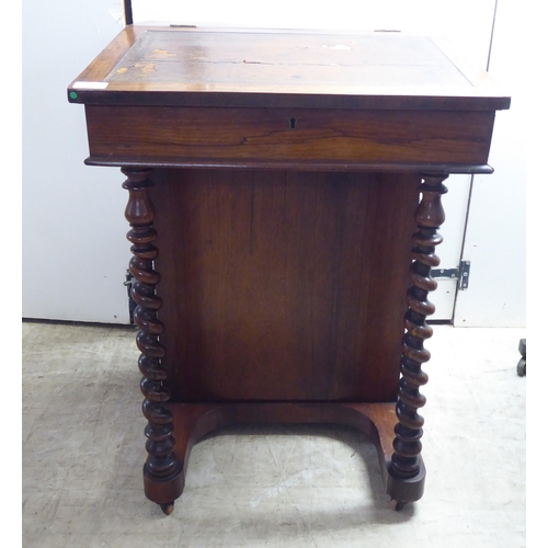 331 - A late Victorian rosewood veneered Davenport with a bank of four right hand drawers, on a concave pl... 