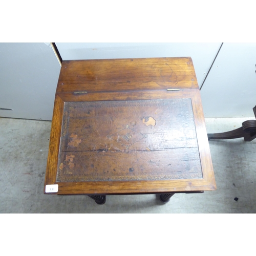 331 - A late Victorian rosewood veneered Davenport with a bank of four right hand drawers, on a concave pl... 