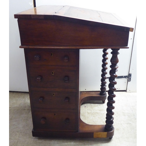 331 - A late Victorian rosewood veneered Davenport with a bank of four right hand drawers, on a concave pl... 