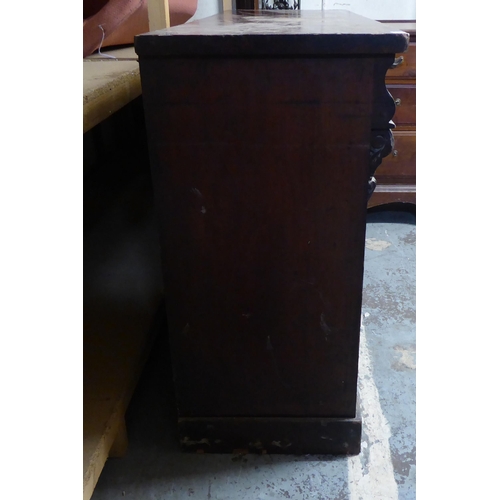 332 - A late Victorian mahogany veneered chiffonier with two frieze drawers, over two arched panel doors, ... 