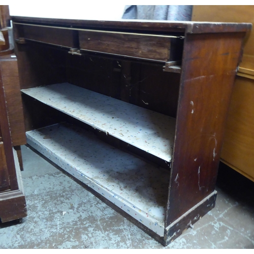 332 - A late Victorian mahogany veneered chiffonier with two frieze drawers, over two arched panel doors, ... 