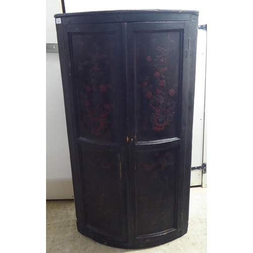 333 - A George III overpainted hanging quadrant corner cabinet with a pair of full height panel doors, enc... 