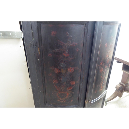 333 - A George III overpainted hanging quadrant corner cabinet with a pair of full height panel doors, enc... 