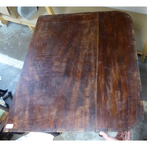 337 - A 19thC crossbanded rosewood and mahogany Pembroke table, raised on turned, tapered legs and casters... 