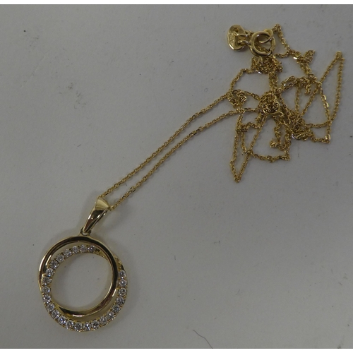 67 - A 9ct gold and diamond set pendant Polo necklace, on a fine neckchain