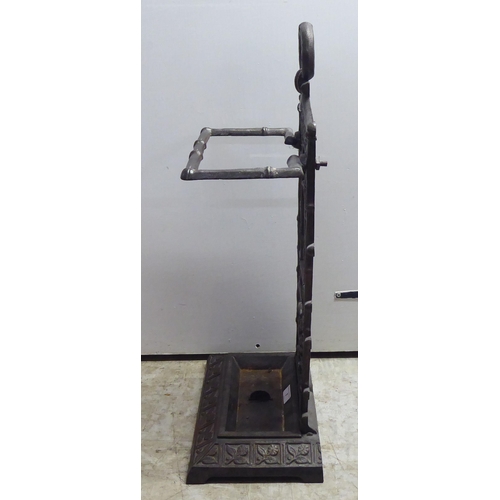 7 - A Victorian style faux bamboo cast iron stickstand  24