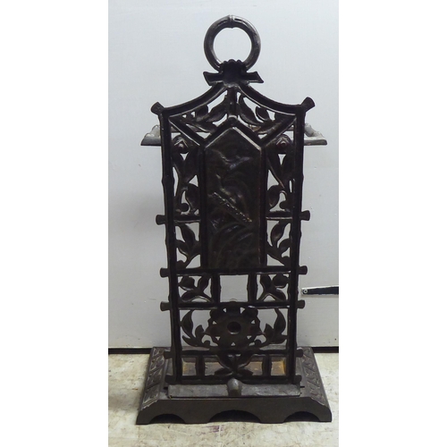 7 - A Victorian style faux bamboo cast iron stickstand  24