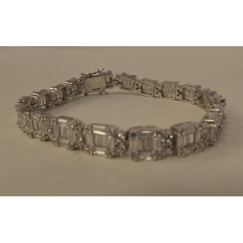 70 - A silver coloured metal and cubic zirconia block link bracelet  stamped 925