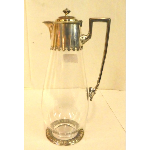 72 - Metalware: to include a glass claret jug with silver plated mounts  10.5