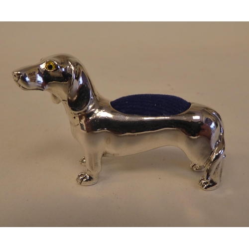 88 - A Sterling silver novelty pin cushion, fashioned as a standing dachshund