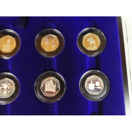 9 - A set of 11/12 Royal Mint Coronation Anniversary silver proof 50p coin collection, in a fitted case