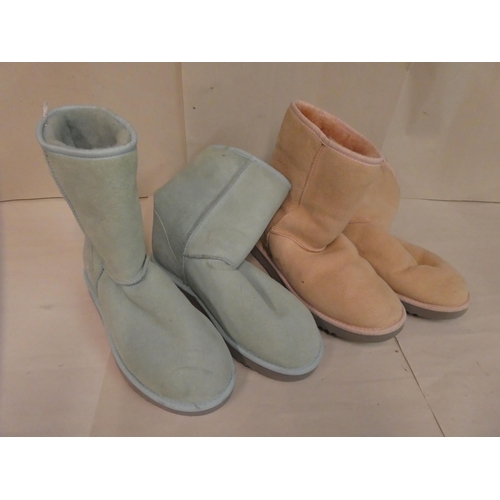 121 - Two pairs of Ugg boots, one in pink, the other baby blue  approx. size 7