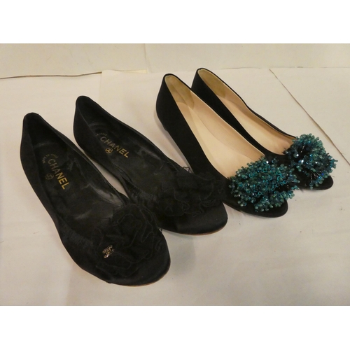 126 - Two pairs of black pumps, viz. Chanel with lace bows  size 40; and Prada, decorated with turquo... 