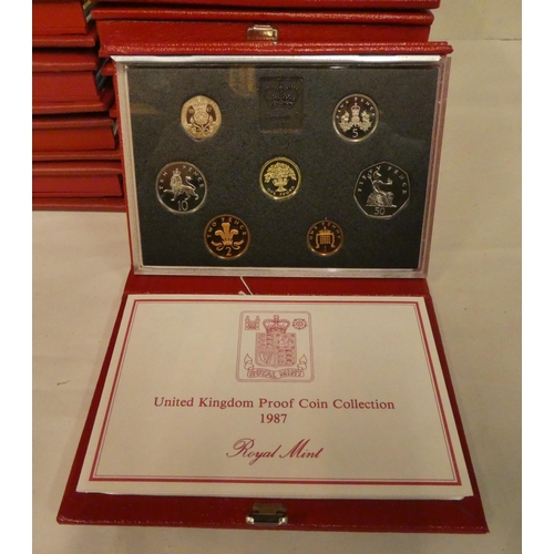 13 - Twenty-five Royal Mint complete cased year proof coin sets: to include 1984