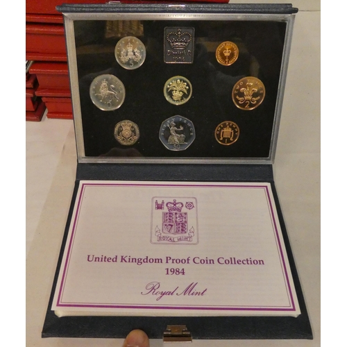 13 - Twenty-five Royal Mint complete cased year proof coin sets: to include 1984