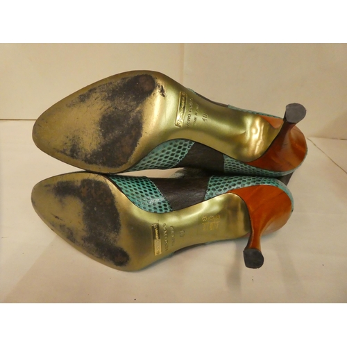 130 - A pair of Dolce & Gabbana multi-coloured boots  size 40 with a dust cover; and a pair of Fe... 