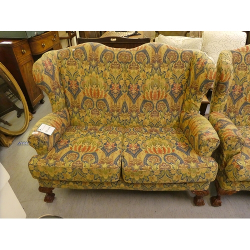 92 - A modern wing back cottage suite, upholstered in a William Morris design floral fabric  compris... 