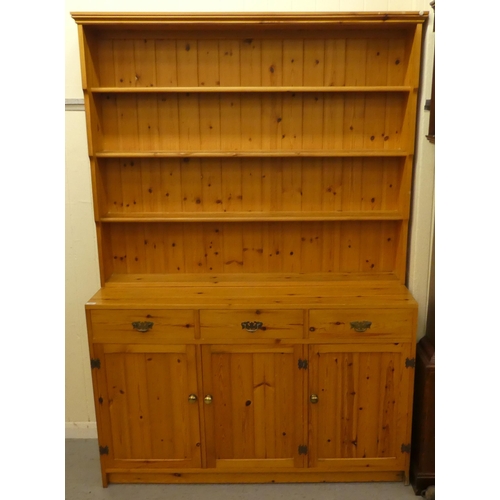 183 - A modern pine two-part dresser, the upper section with four open shelves, the back with three drawer... 