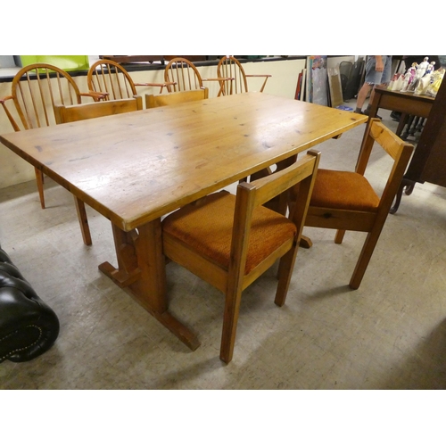 193 - A 20thC honey coloured waxed pine kitchen table, raised on planked supports and splayed feet  3... 