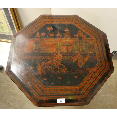 78 - A mid 20thC Asian occasional table, the overpainted octagonal top on hinged folding legs  24