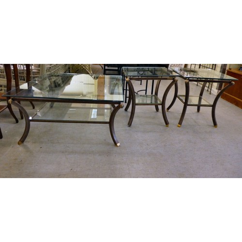 73 - A suite of modern Pierre Vandel of Paris glass topped and cast metal framed furniture, viz. a pair o... 