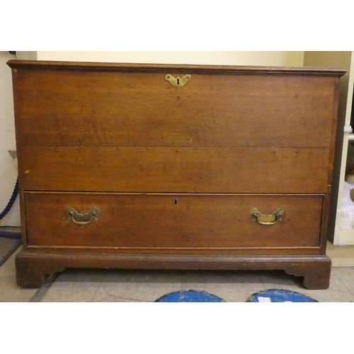 89 - A 19thC oak mule chest with straight sides and a hinged lid, over a front facing long base drawer, r... 
