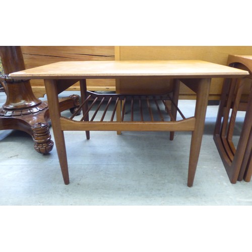 17 - 1980s teak furniture, viz. a nesting set of three tables  largest 19