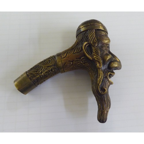 83 - A Victorian style cast brass walking cane handle, fashioned as a rabbi's head