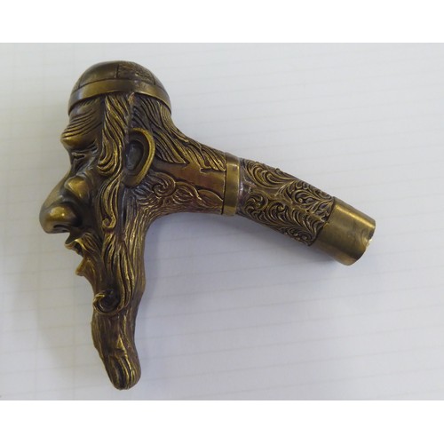 83 - A Victorian style cast brass walking cane handle, fashioned as a rabbi's head