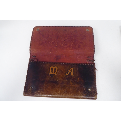 10 - A mixed lot: to include a moulded stitched brown hide writing case folder; a bright cut engraved sil... 