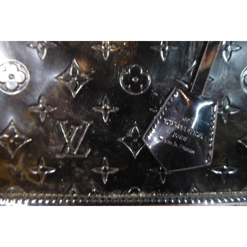 52 - A black patent, oversize handbag with padlock and dust cover