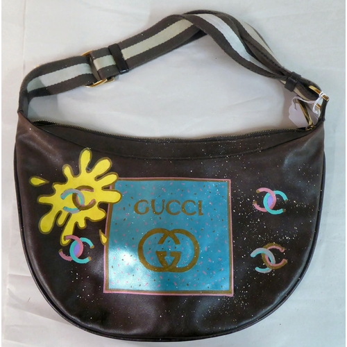 57 - Four various bags: to include a brown example, decorated with a panel depicting Marilyn Monroe; and ... 