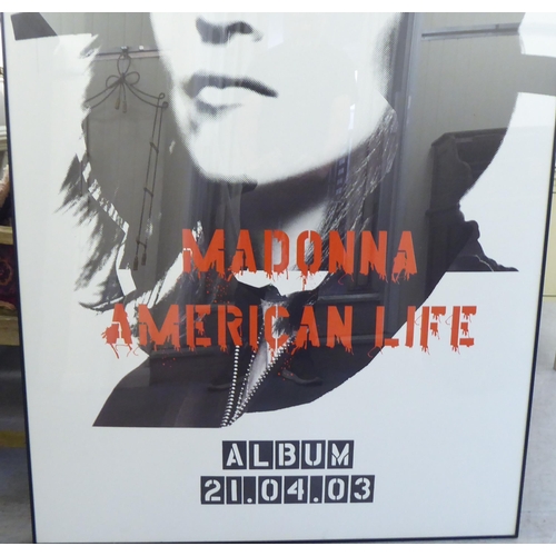 58 - A head and shoulders photographic portrait, advertising 'Madonna, American Life Album 21.04.03' ... 