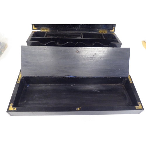 59 - A late 19thC ebony writing slope with straight sides and angled, hinged lid and fold-down scriber  6... 