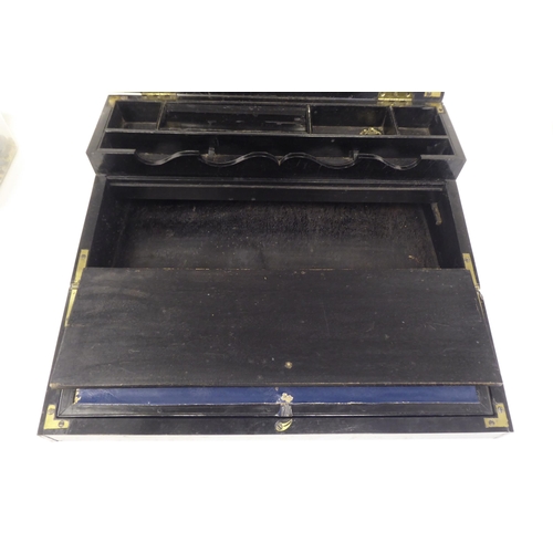 59 - A late 19thC ebony writing slope with straight sides and angled, hinged lid and fold-down scriber  6... 