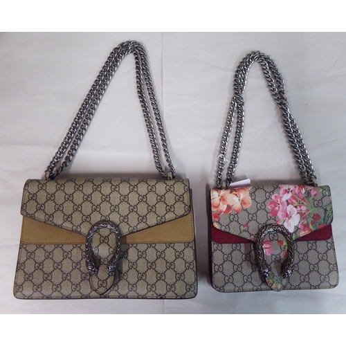 61 - Two similar shoulder bags, one with floral decoration, both with metal snake style catches