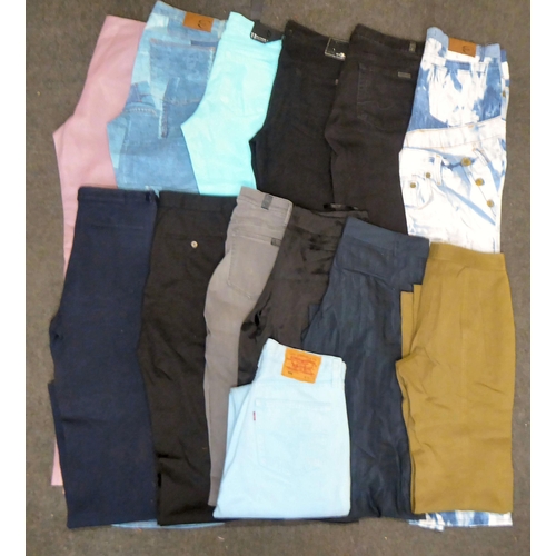 66 - Ladies trousers: to include a pink leather pair of DKNY jeans; a pair of pale blue jeans by Flying M... 