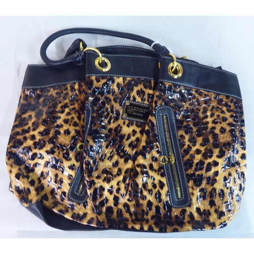 7 - Three oversize tote bags, viz. faux leopard skin pattern; deep yellow and bright pink