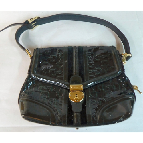 72 - Various handbags: to include a red patent example, ornamented with metal studs; a bottle green paten... 