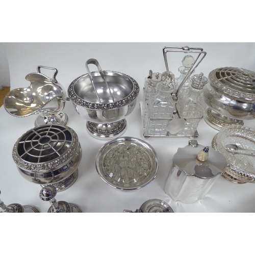 8 - Silver plated and stainless steel tableware: to include a four piece cruet with moulded glass recept... 