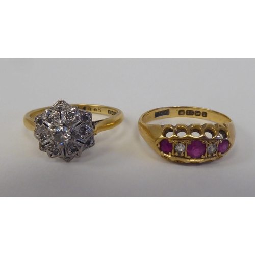 91 - Two 18ct rings, one set with a diamond cluster; the other set with alternating rubies and diamonds