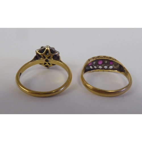 91 - Two 18ct rings, one set with a diamond cluster; the other set with alternating rubies and diamonds