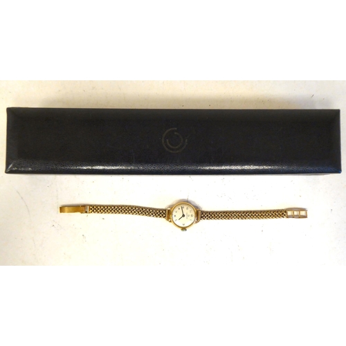 94 - A lady's 9ct gold cased Certina wristwatch, faced by an Arabic dial