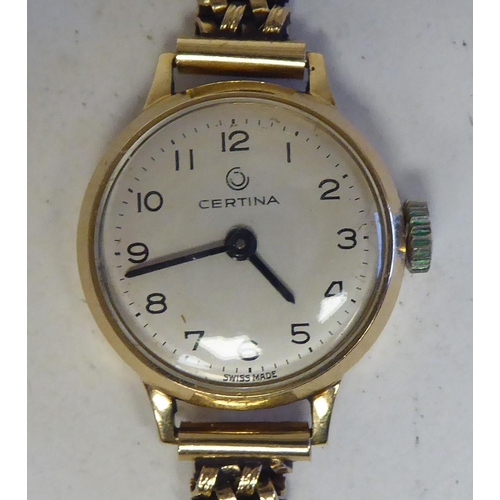 94 - A lady's 9ct gold cased Certina wristwatch, faced by an Arabic dial