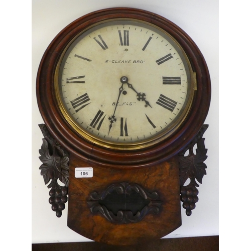 106 - A mid Victorian walnut cased drop dial timepiece with applied fruiting vine carved ornament and a pe... 