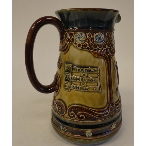 110 - A Doulton Lambeth two tone brown and green stoneware jug of tapered form, celebrating the life of Qu... 